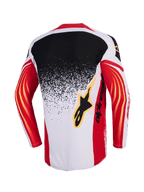 Alpinestars 2026 Techstar Nomur tröja, motocrosströja, ljusgrå, röd och svart, baksida med en svart till ljusgrå tonad splatter-design, röda ärmar med gula böjda detaljer och svart Alpinestars-logotyp på ryggen.