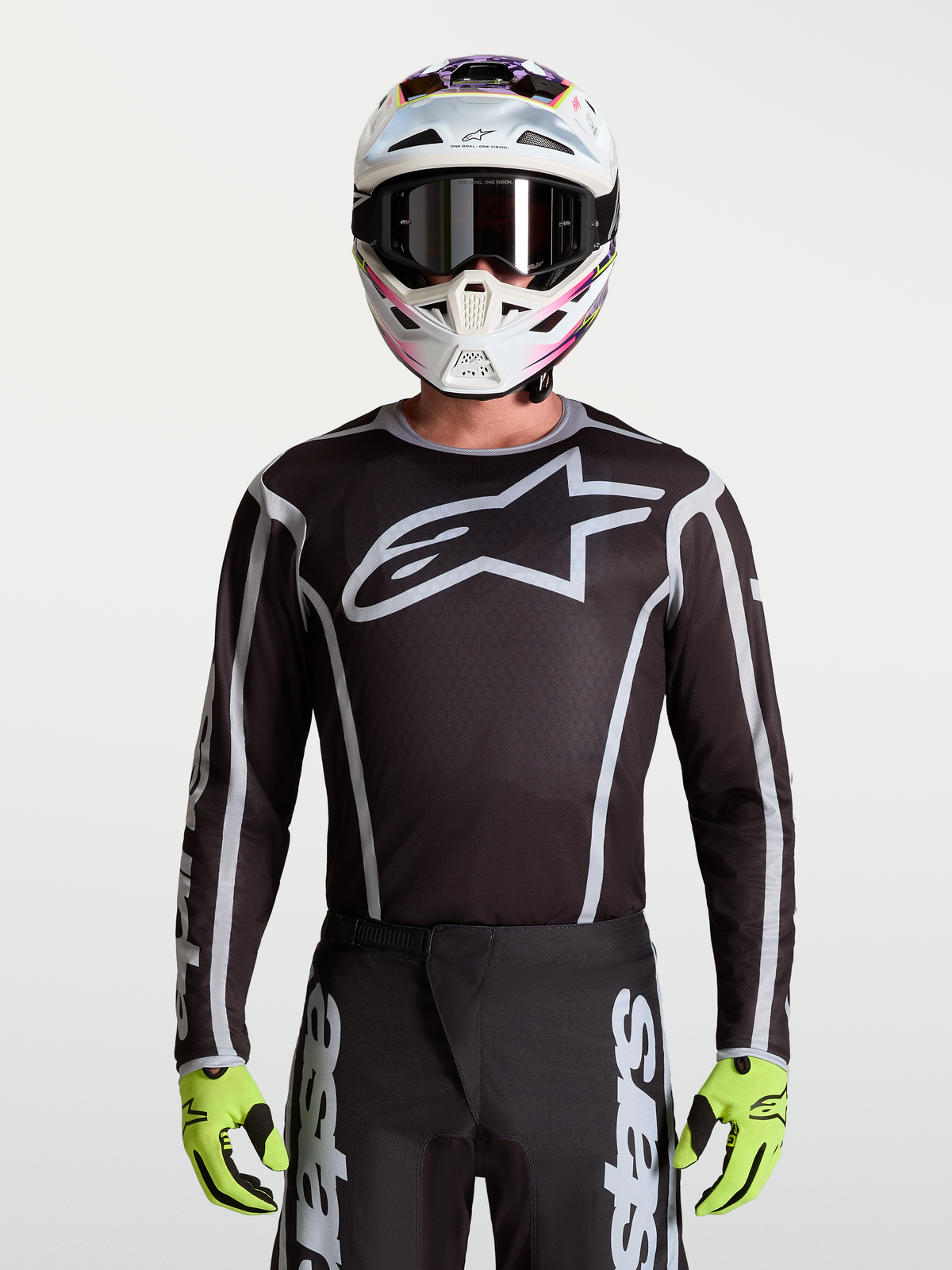 Alpinestars Fluid Apex V2 tröja, motocrosströja för herrar, svart och silver, stor stjärnlogotyp och atletisk passform.