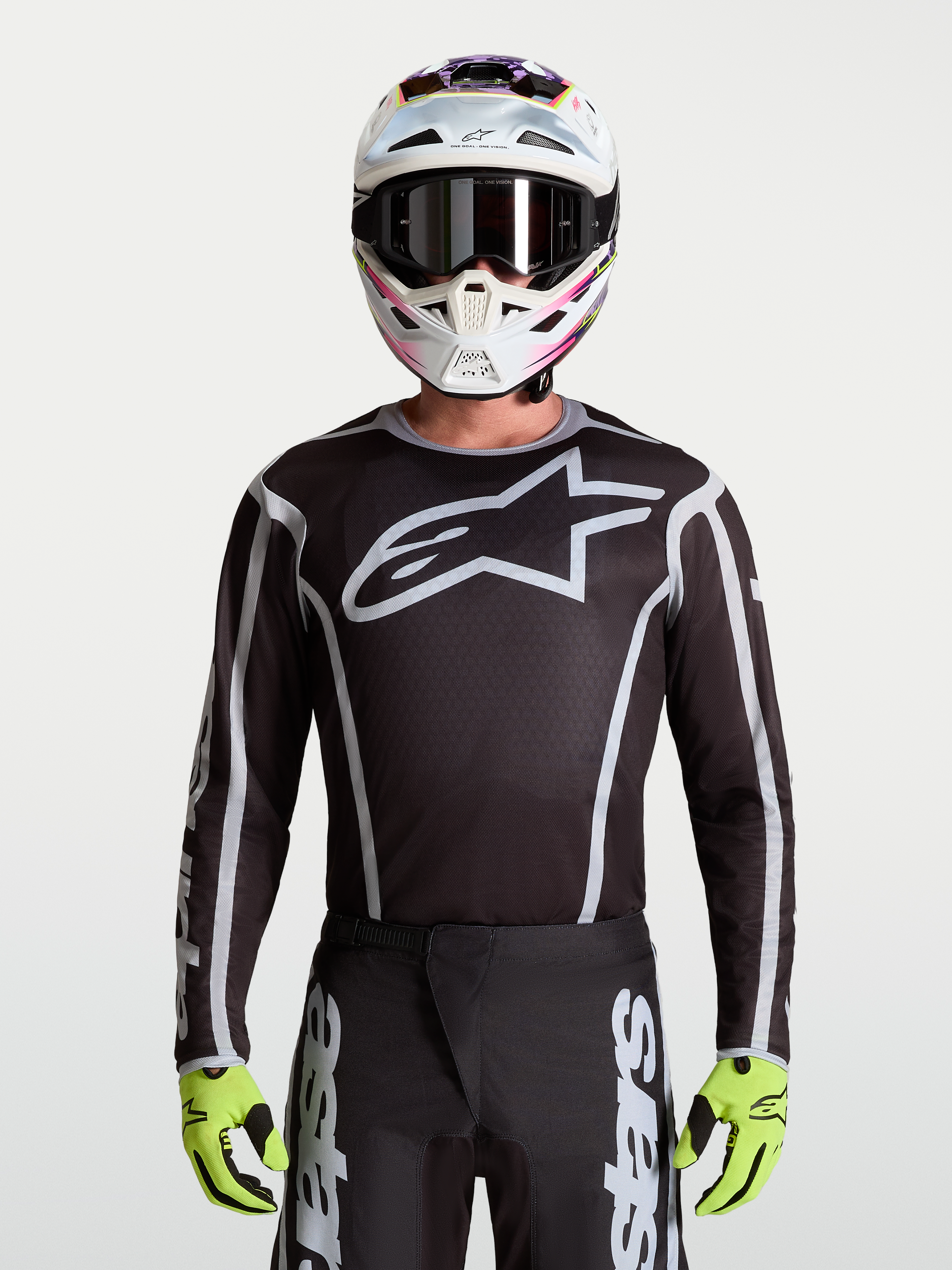Alpinestars Fluid Apex V2 tröja, motocrosströja för herrar, svart och silver, stor stjärnlogotyp och atletisk passform.