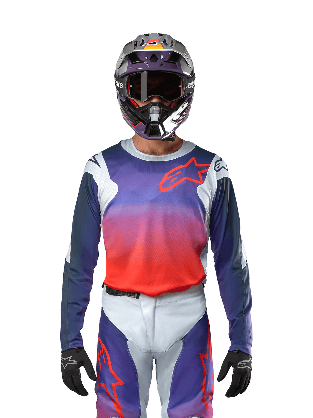 Alpinestars 2024 Racer Hoen Jersey i ljusgrå, stark orange och svart, motocrosströja som bärs av en förare med matchande utrustning, med en livfull färggradient och Alpinestars stjärnlogotyp på bröstet, designad för offroad-prestanda.