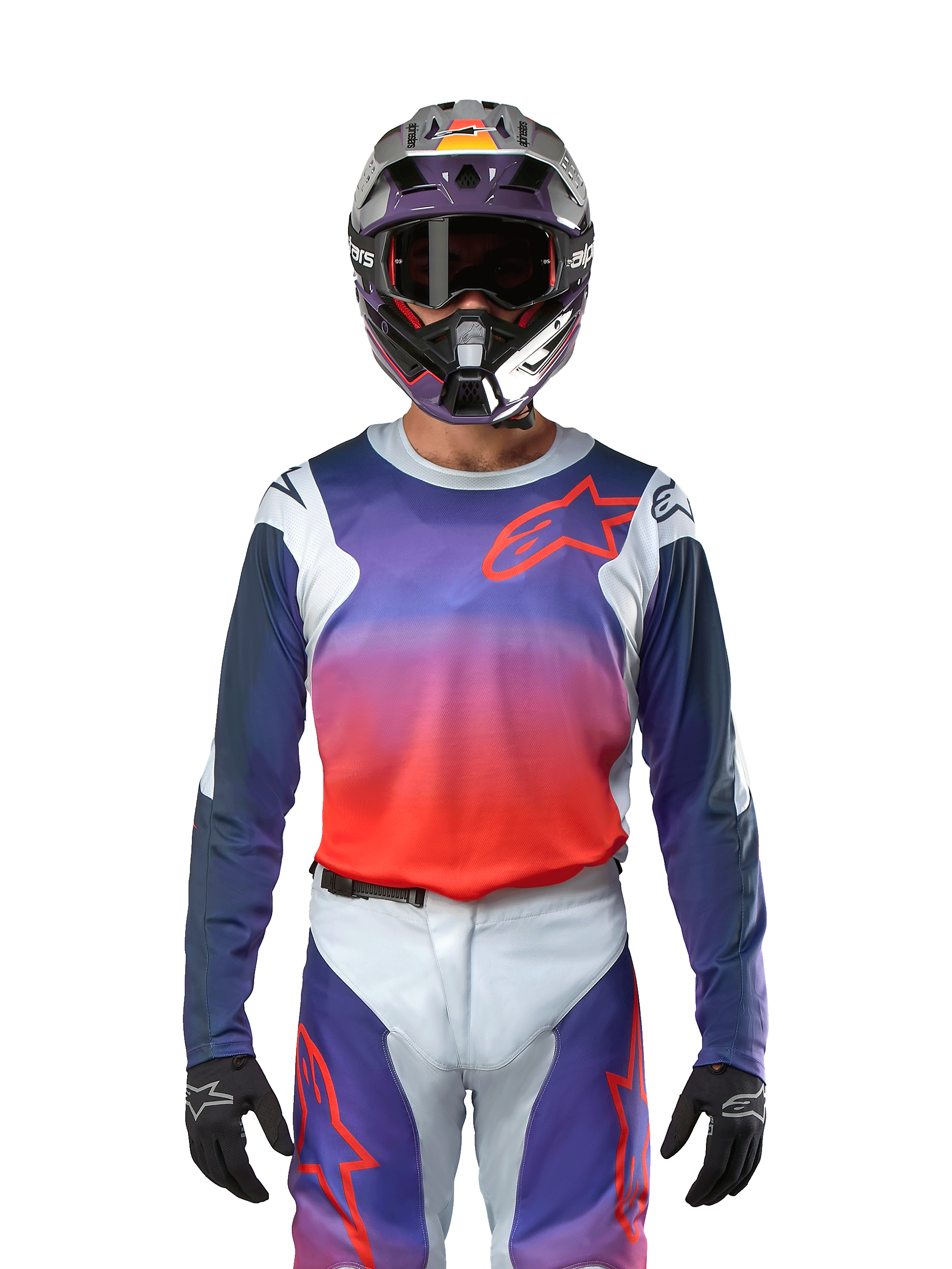 Alpinestars 2024 Racer Hoen Jersey i ljusgrå, stark orange och svart, motocrosströja som bärs av en förare med matchande utrustning, med en livfull färggradient och Alpinestars stjärnlogotyp på bröstet, designad för offroad-prestanda.