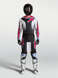 Alpinestars Fluid Drag tröja och utrustningsset, svartvitt motocrosskit med röd grafik för terrängkörning.