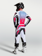 Alpinestars Fluid Drag tröja, motocrossutrustning för herr, svart, vit och röd fluo, andningsbart fukttransporterande tekniskt material, vy bakifrån på modell.