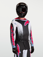 Alpinestars Fluid Drag tröja, svart och vit motocrosströja för herr med röda och blå detaljer, lättviktigt material