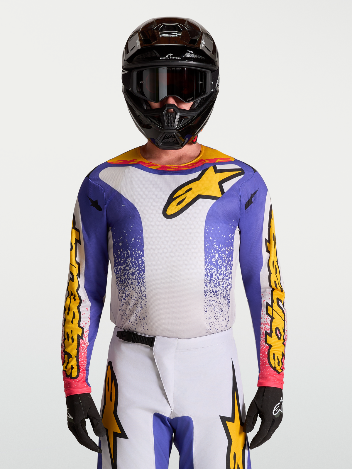 Alpinestars Fluid Drag Jersey, Men's Motocross Jersey in Blue Iris and Gold with moisture-wicking fabric.