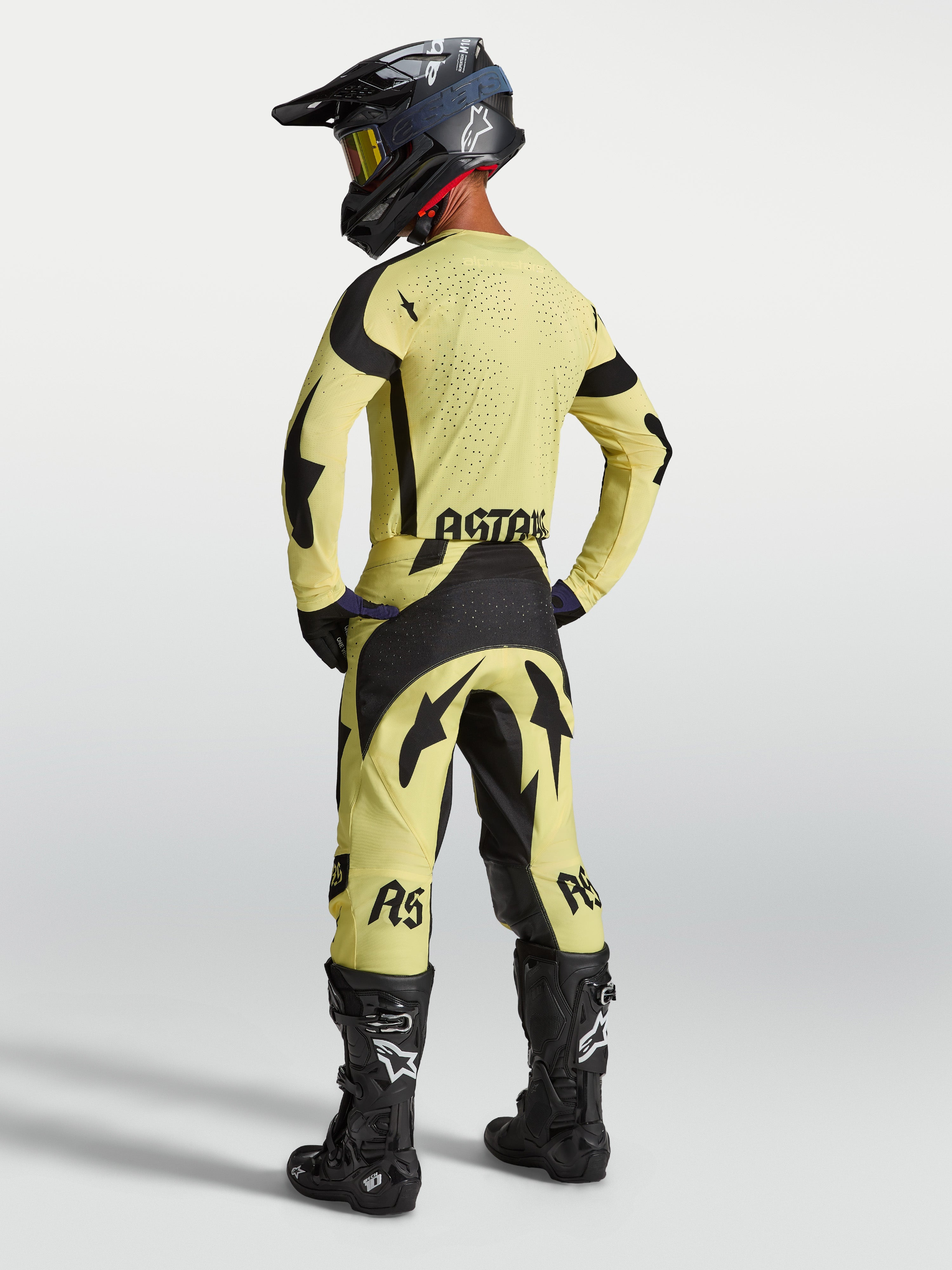 Alpinestars Techstar Atrox tröja, gul och svart motocrosströja för herr med laserskuren ventilation, vy bakifrån.