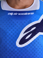 Alpinestars 2026 Racer Air Portl Jersey, Motocross Jersey, Ucla Blue and White, detailed view of the perforated mesh fabric, white stretch collar, and Alpinestars logo on the chest