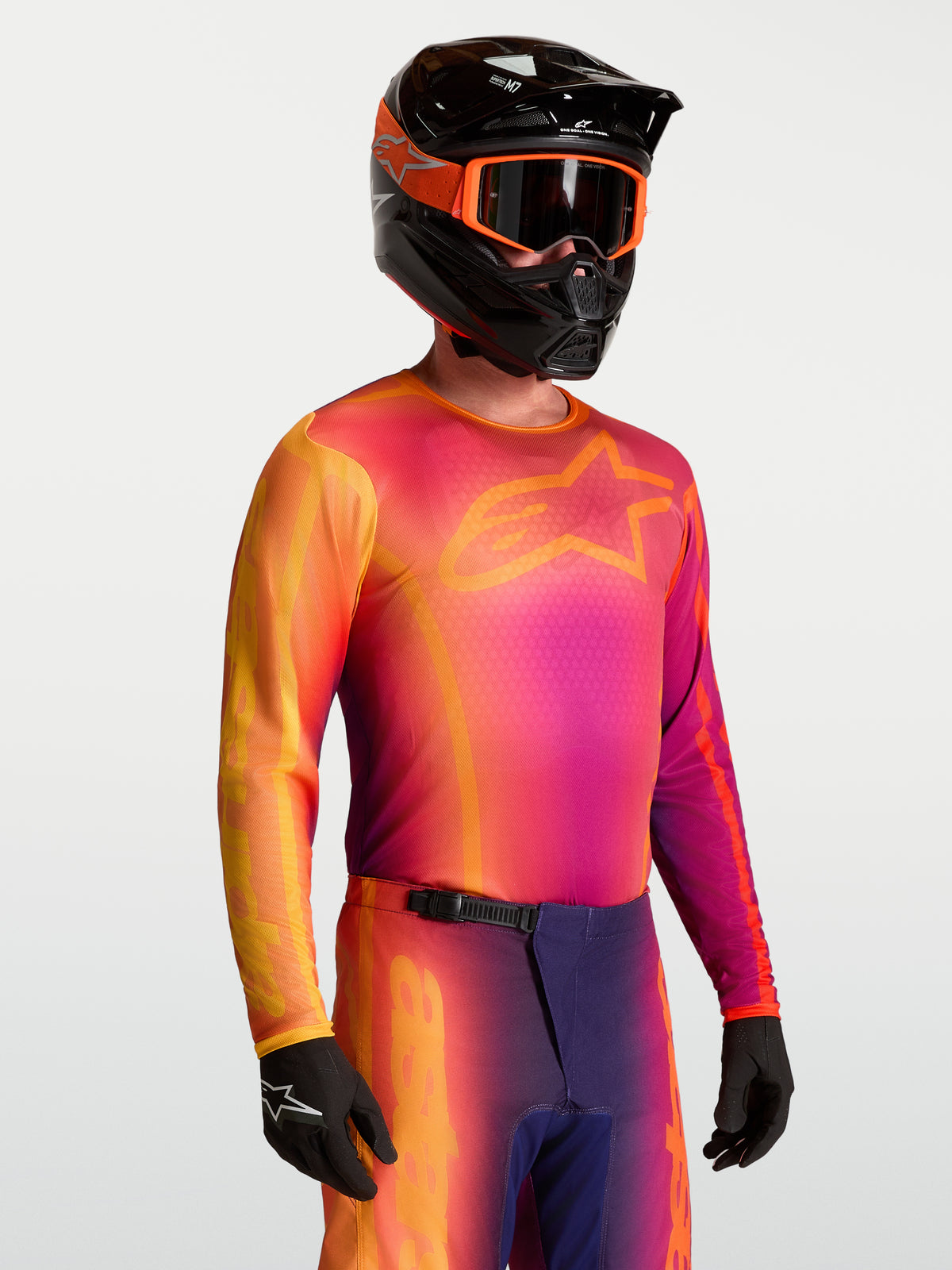 Alpinestars Fluid Kepler tröja, lila och orange motocrosströja för herr i fuktavledande polytyg med atletisk passform.