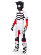 Alpinestars Limited Edition Techstar Deep Gear Set, full motocross racing apparel, white jersey with black wave patterns and red sleeves, white pants with red and black accents, black helmet with silver goggles, white and black gloves, white boots, coordinated MX racing outfit