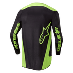 Alpinestars 2024 Fluid Lurv-tröja, motocross-tröja, svart och neongul, vy bakifrån med neongula sidopaneler, en stor stjärnlogotyp på nedre delen av ryggen och Alpinestars-logotyper på ärmarna