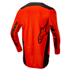 Alpinestars 2024 Fluid Lurv-tröja, motocrosströja, orange och svart, baksida som visar en stor svart stjärnlogotyp och Alpinestars-logotyper på ärmarna, förlängt ryggparti för bättre täckning, lättviktigt poly-material för terrängkörning