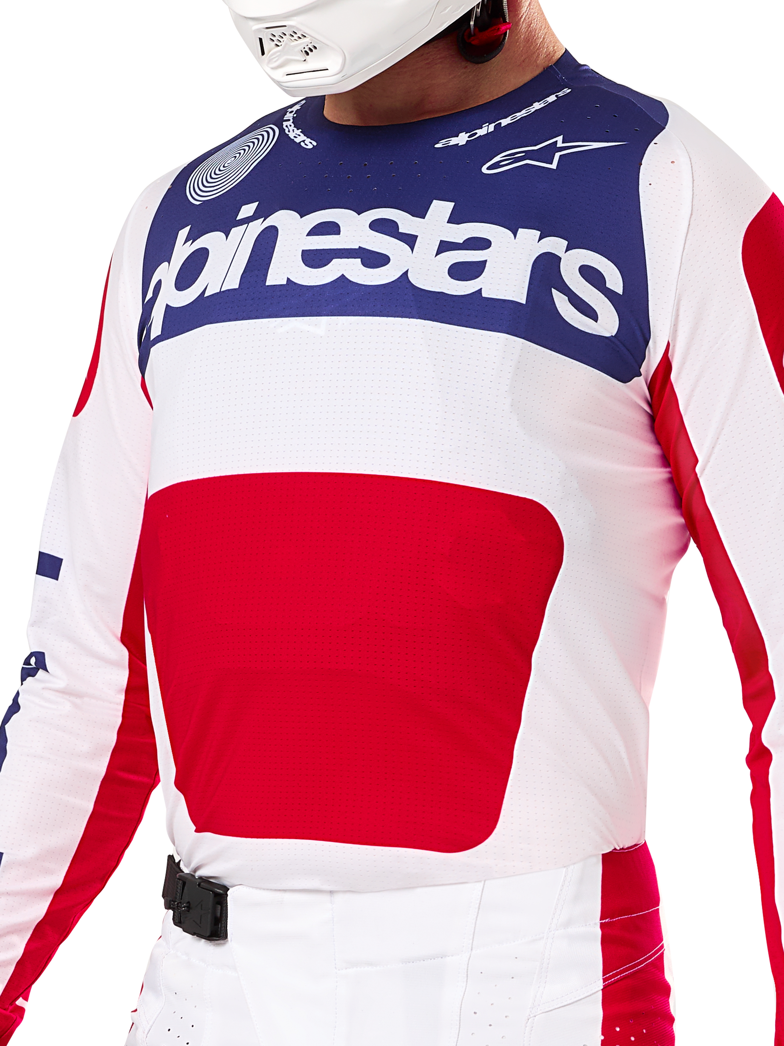 Alpinestars Limited Edition Techstar Fortitude Gear Set, Motocross Jersey and Pants in Red White and Blue, featuring a white jersey with a navy blue upper panel and a large red center graphic, matching white and red pants with an SX2 magnetic buckle, athletic fit with laser-cut perforations for off-road racing.