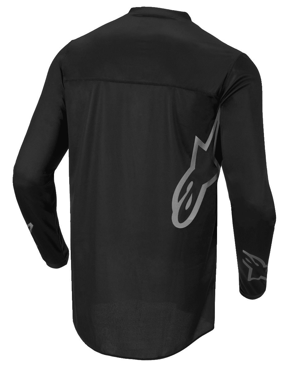 Alpinestars Fluid Graphite tröja, motocrosströja, svart och mörkgrå, vy bakifrån, med stor grå Alpinestars-logotyp på sidan och grafik på ärmarna, lätt fukttransporterande material för terrängkörning