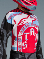 Alpinestars Techstar Beast Coast-tröja, vit och röd motocrosströja med blå grafik och atletisk passform.