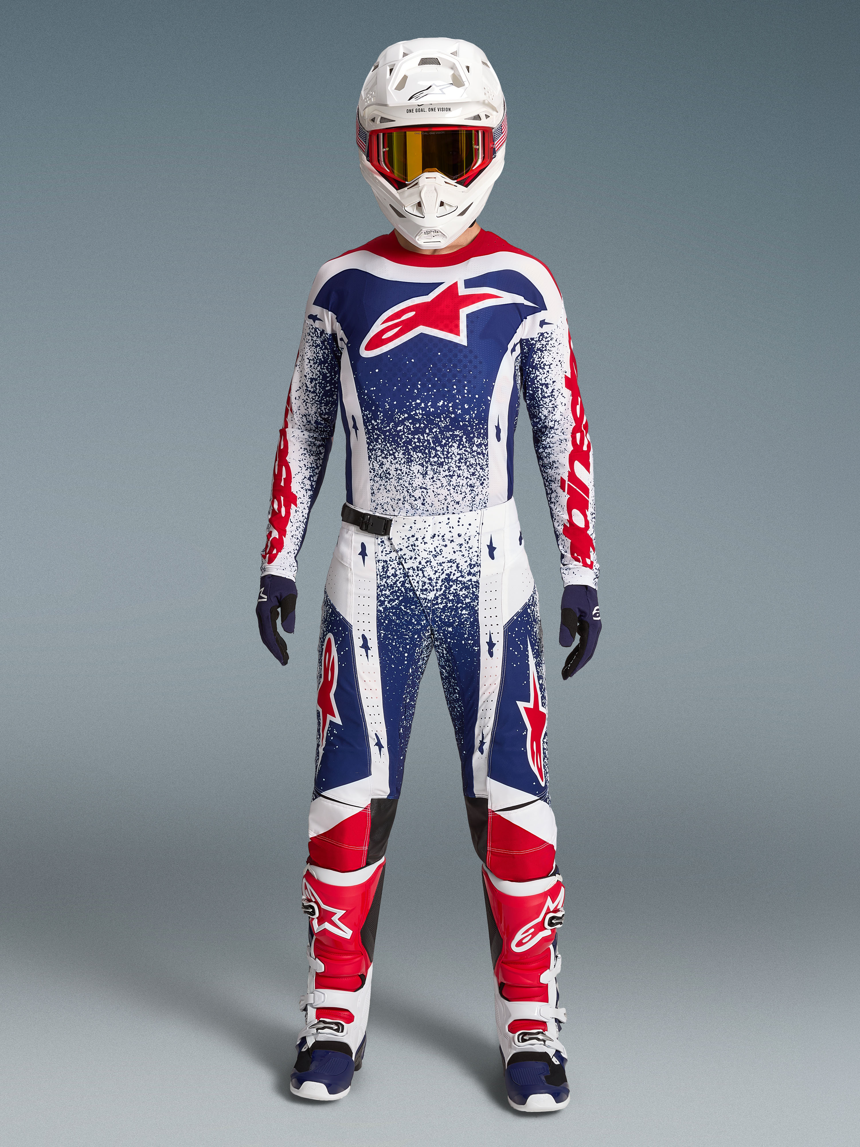 Alpinestars Limited Edition Techstar Unity Gear Set, Men's Motocross Racing Outfit in White, Blue, and Red graphics.