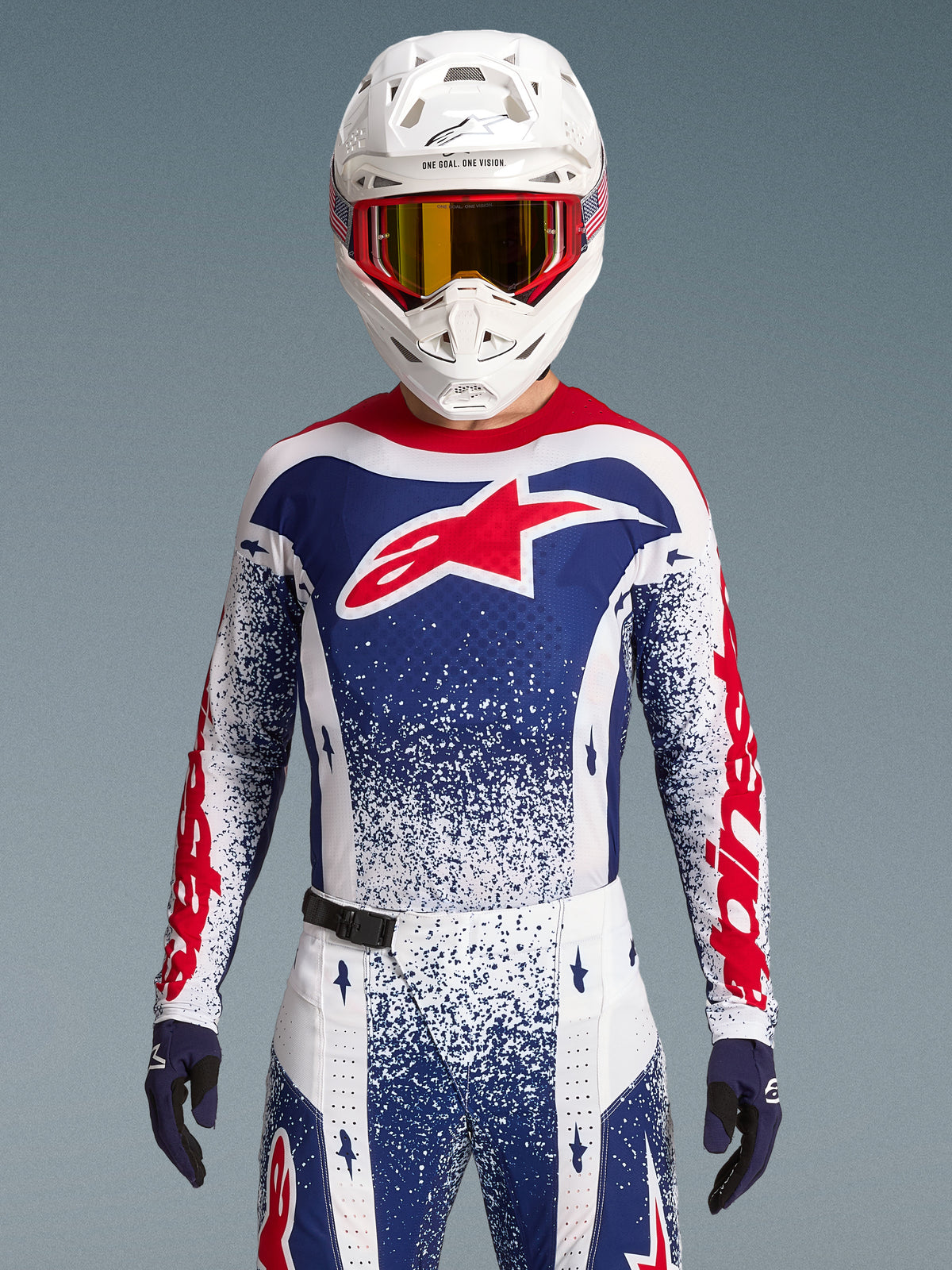 Alpinestars Limited Edition Techstar Unity tröja, röd, vit och blå motocrosströja med splattergrafik och racingpassform.
