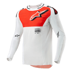 Alpinestars 2024 Supertech Ward-tröja, motocrosströja, vit och Hot Orange, långärmad teknisk tröja med en stor orange grafik på bröstet, stjärnlogotyp och ventilerande perforerad konstruktion för terrängkörning.