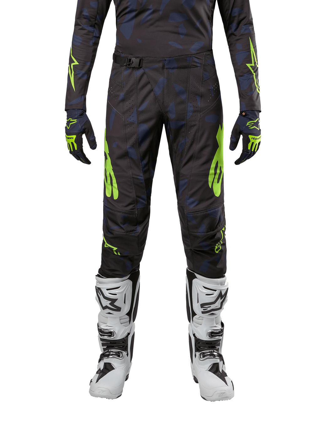 Alpinestars 2024 Techstar Rantera byxor, motocrossbyxor, svart, marinblå och neongul, bärs med matchande långärmad tröja, handskar och vita motocross-stövlar, med framträdande neongula accenter och ett abstrakt mörkt mönster.