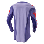 Alpinestars 2024 Techstar Ocuri Jersey, motocrosströja, lila och Hot Orange, vy bakifrån med lila multipaneldesign och orange logotypgrafik på ärmar och axlar, förlängd bakdel för prestanda vid terrängkörning.