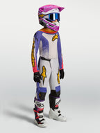 Alpinestars ungdom Fluid Drag gear set, motocrossutrustning för unga, blå och vit med rosa och gulddetaljer.