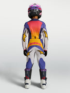 Alpinestars 2027 ungdom Fluid Drag tröja och utrustningsset, blå och guld motocrossutrustning sedd bakifrån.
