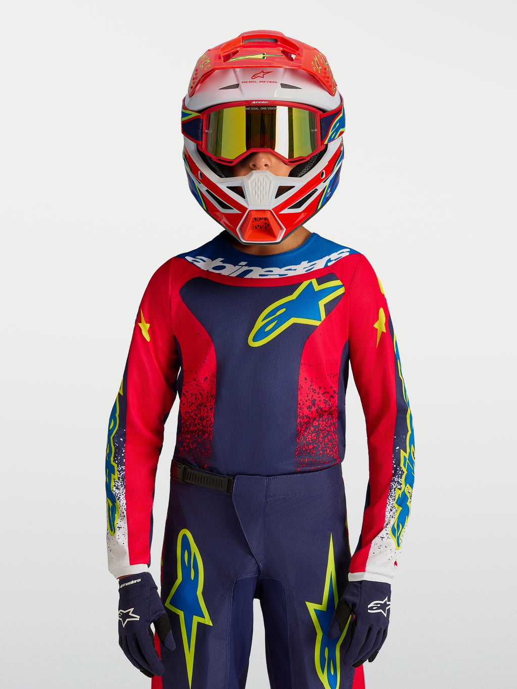 Alpinestars 2027 Fluid Drag ungdomströja, mörkblå och röd motocrosströja med gula detaljer för unga förare.