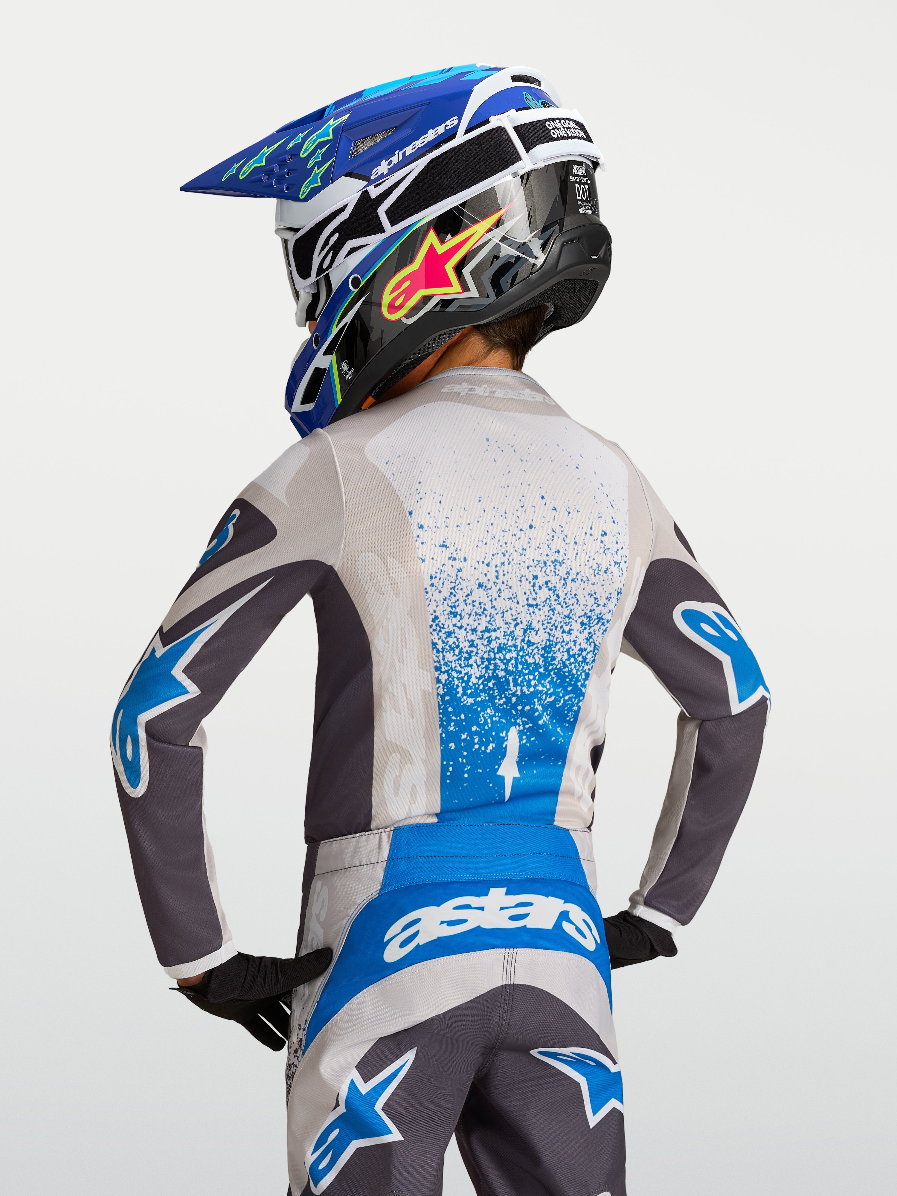 Alpinestars ungdom Fluid Drag tröja, grå och blå motocrosströja för barn, fuktavledande tekniskt material.