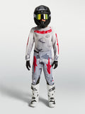 Alpinestars 2027 Ungdom Fluid Lone tröja och gear set, grått kamouflagemönster och rött för motocross och terrängkörning.