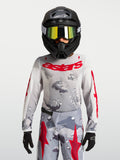 Alpinestars 2027 Ungdom Fluid Lone tröja, grå camo och röd motocrossutrustning, prestandaorienterad textilkonstruktion.