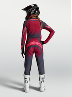 Alpinestars Stella Techstar Swan Gear Set och byxor, mörkgrå och röd dam-motocrossutrustning, vy bakifrån.