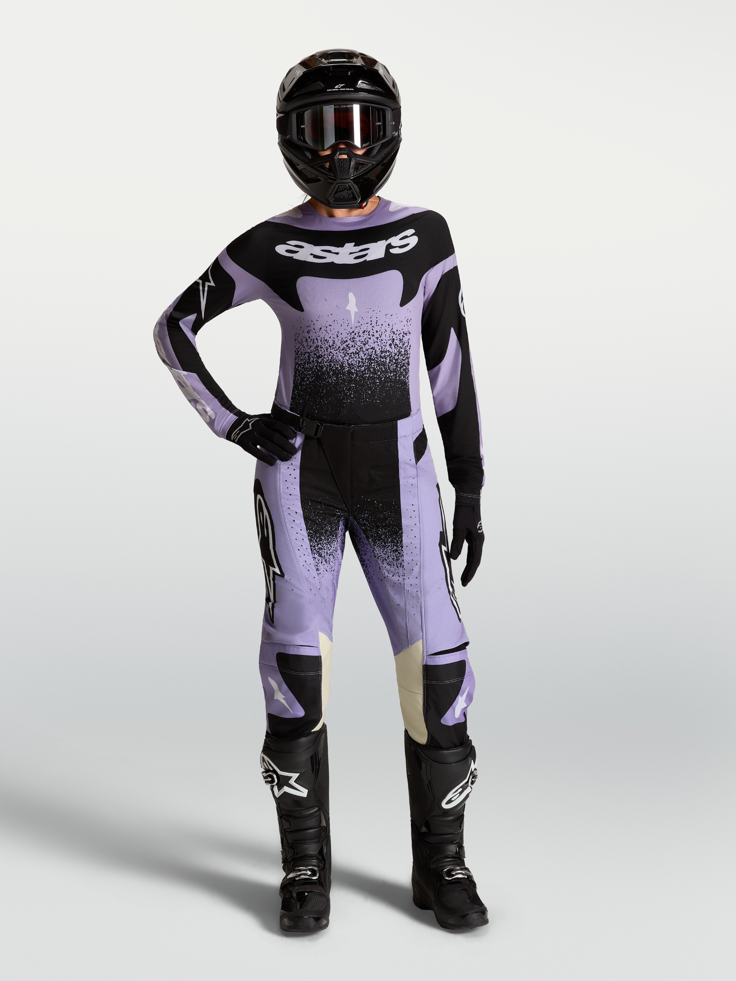 Alpinestars Stella Techstar Swan Gear Set, dam-motocrossset i ljuslila och svart, tröja och byxor med Swan-grafik.