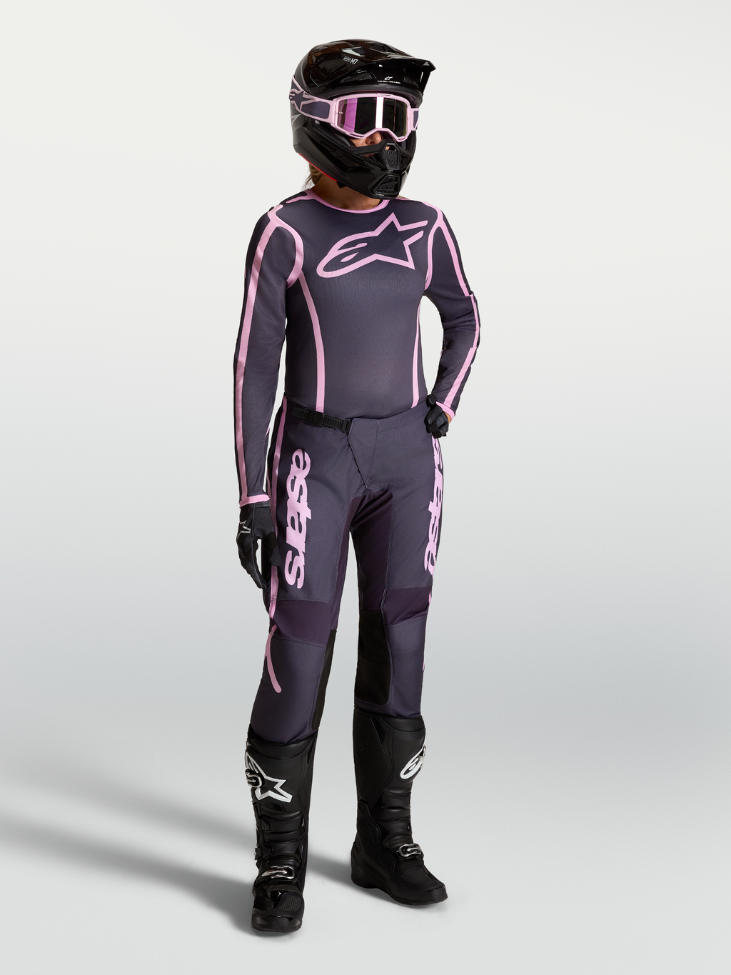 Alpinestars Stella Fluid Apex V2 Jersey and Gear Set, Women's Motocross Outfit in Graystone and Pink with black racing boots.