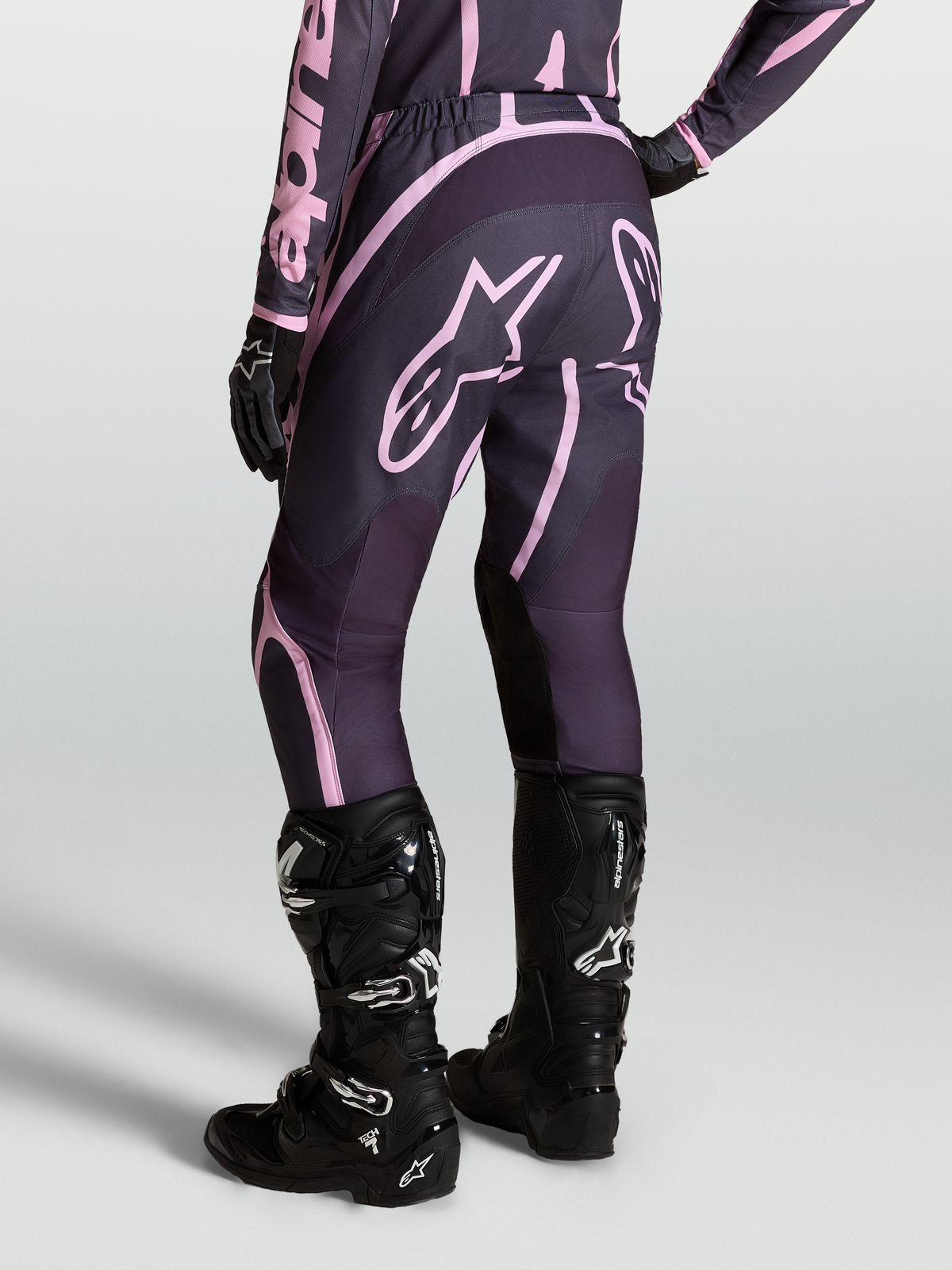 Alpinestars Stella Fluid Apex V2 Pants, Women's Motocross Pants in Graystone and Old Pink, paired with Tech 7 boots.