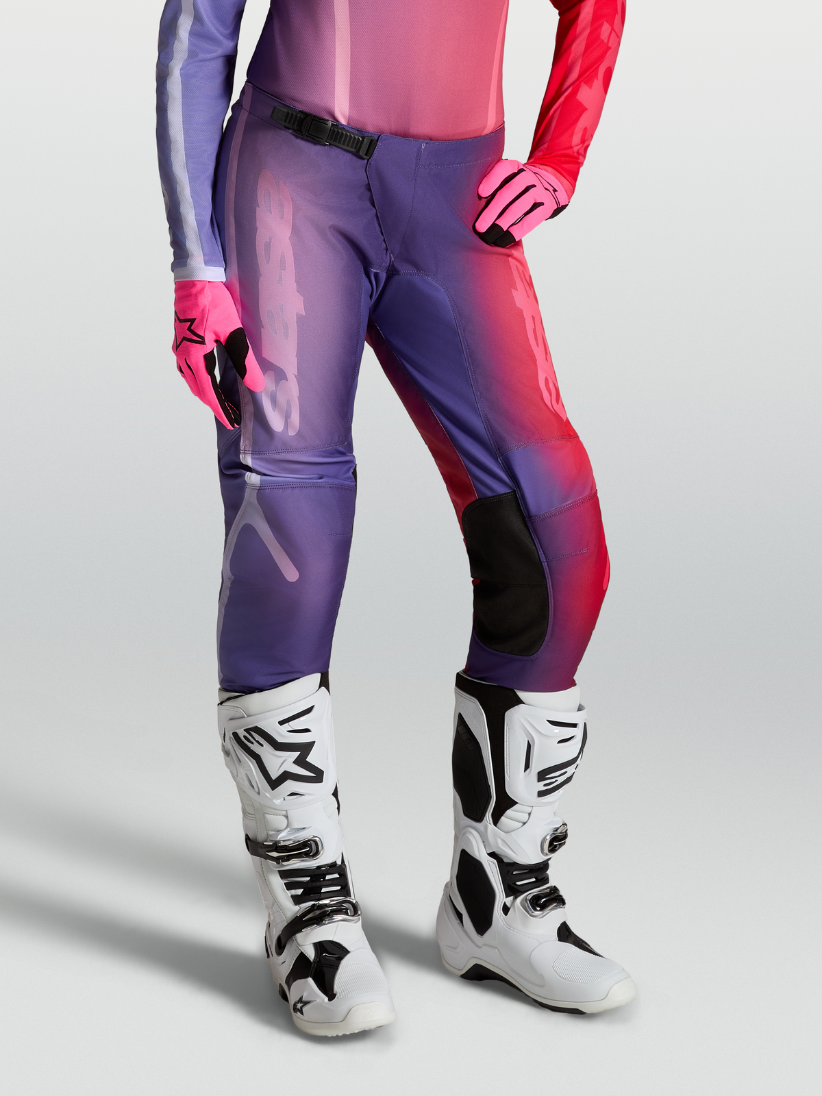 Alpinestars Stella Fluid Kepler Pants, women's motocross gear in purple and rouge red, featuring a durable textile construction.