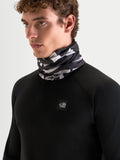 Alpinestars Buff All Terra Primaloft Neck Tube, motorcycle and outdoor neck warmer in black and gray, worn by a model, featuring PrimaLoft insulation and low-bulk tubular textile construction