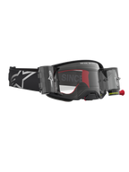 Alpinestars Supertech Firma Roll Off Goggles, motocrossglasögon för terrängkörning, svarta och silver med klart roll-off-system, professionell racingutrustning.