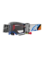 Alpinestars Supertech Corp Goggles Roll Off, motocrossglasögon, blå och orange design, vit ram med klar lins och roll-off-system, har wide vision-patroner och en blå Astars-logotyp på remmen.