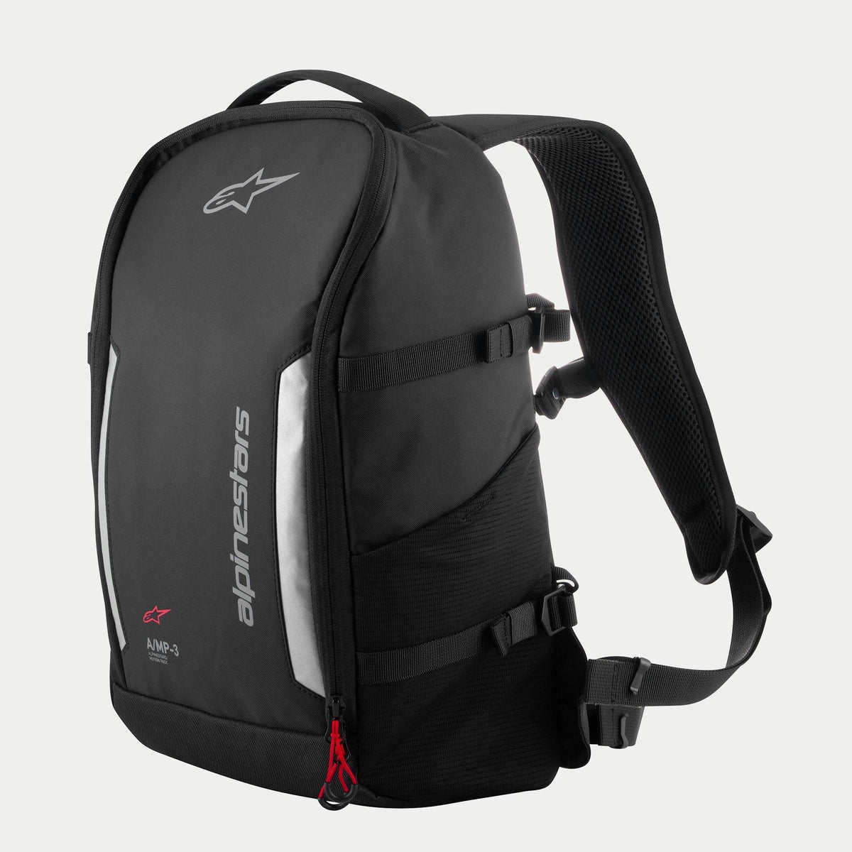 Alpinestars AMP3 Backpack, Black technical motorcycle bag with white logos, silver reflective panels, red zipper pulls, adjustable side compression straps, and padded mesh shoulder straps.