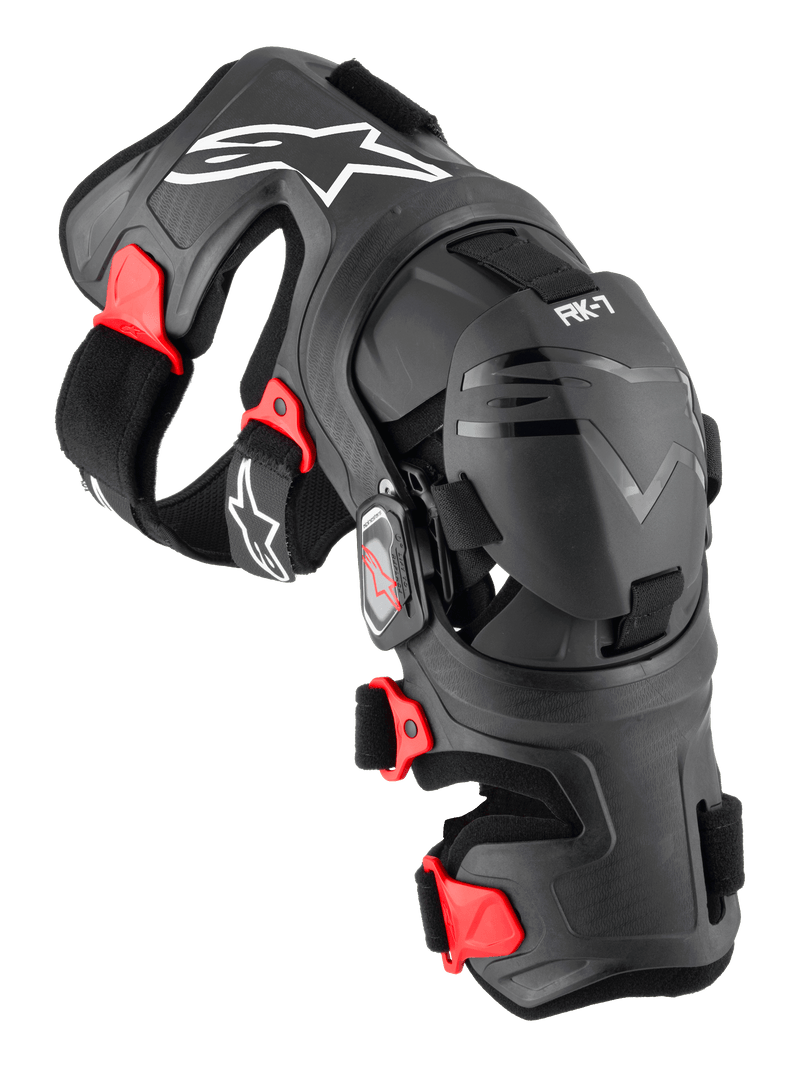 Alpinestars RK-7 Plasma Knee Brace, Motocross Knee Protector, Black with Red accents and white logos, ergonomic fiber-reinforced frame with adjustable straps and four-point hinge system, durable off-road protection gear