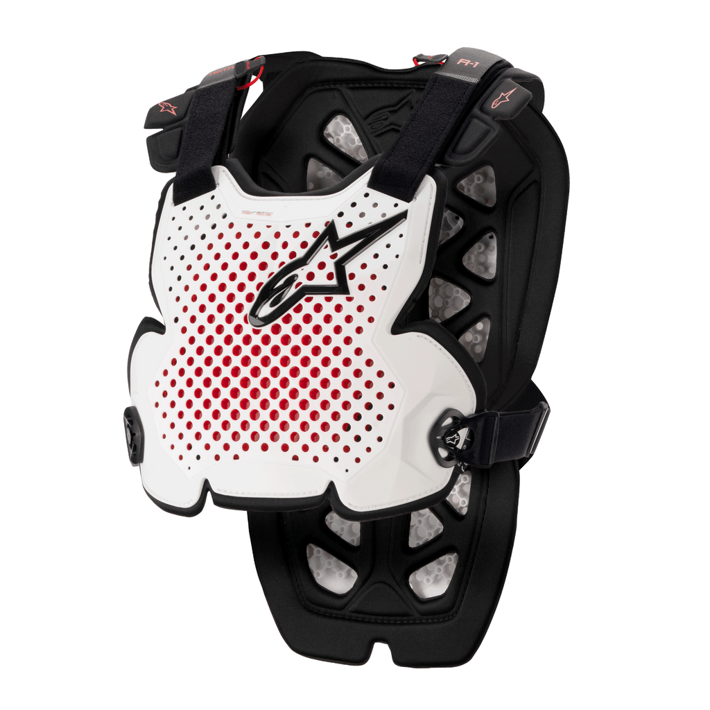 Alpinestars A-1 Pro Chest Protector, bröstskydd för motocross, vit, svart och röd, med perforerad ventilation och röd insida, svart stjärnlogotyp, justerbara svarta remmar, lätt skyddsvaddering för terrängkörning