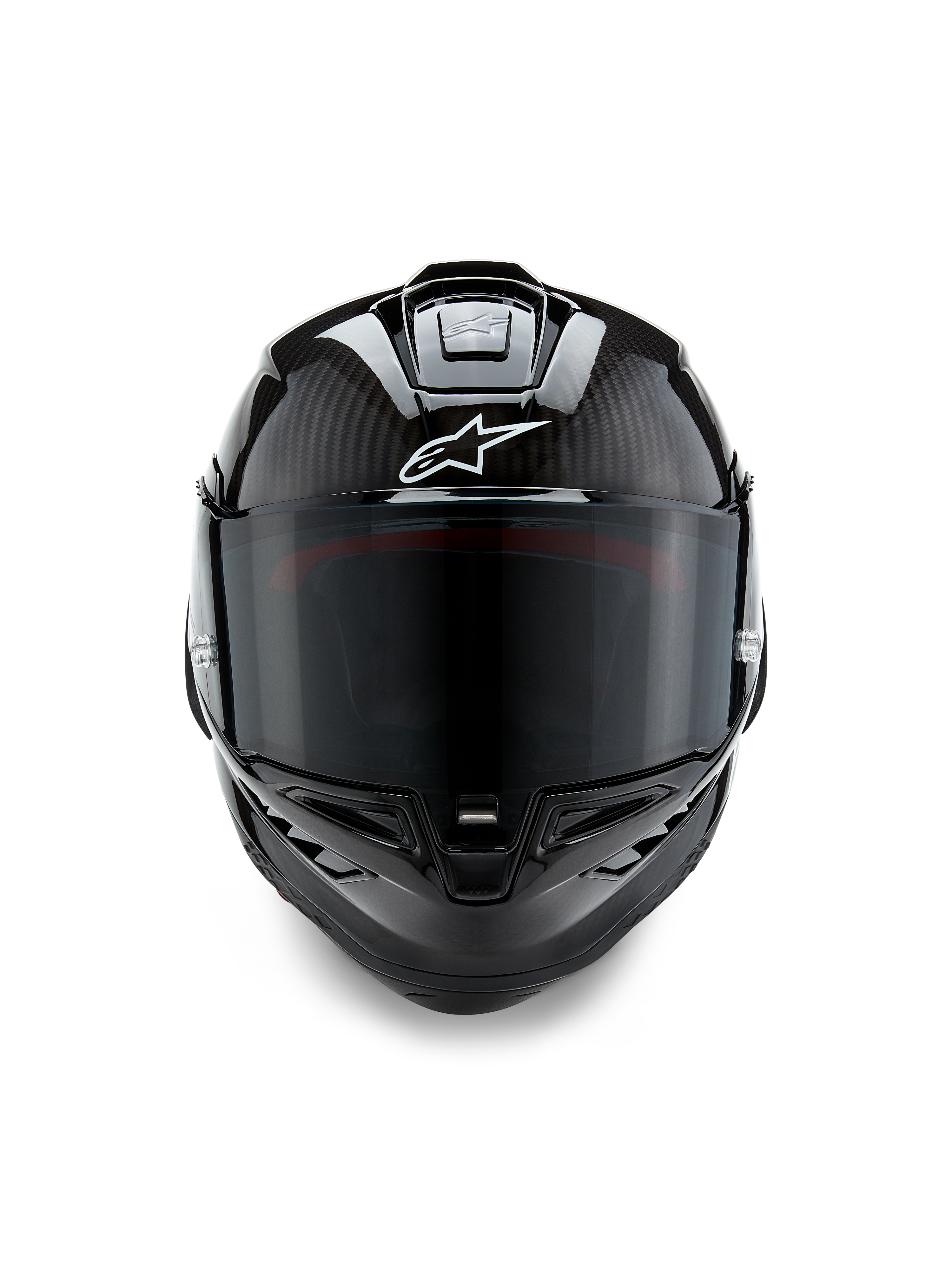 Alpinestars Supertech R10 Solid Helmet, Front View, Black Carbon Matte and Glossy finish, visible carbon fiber weave, white Alpinestars logo, dark smoke visor, aerodynamic racing motorcycle helmet