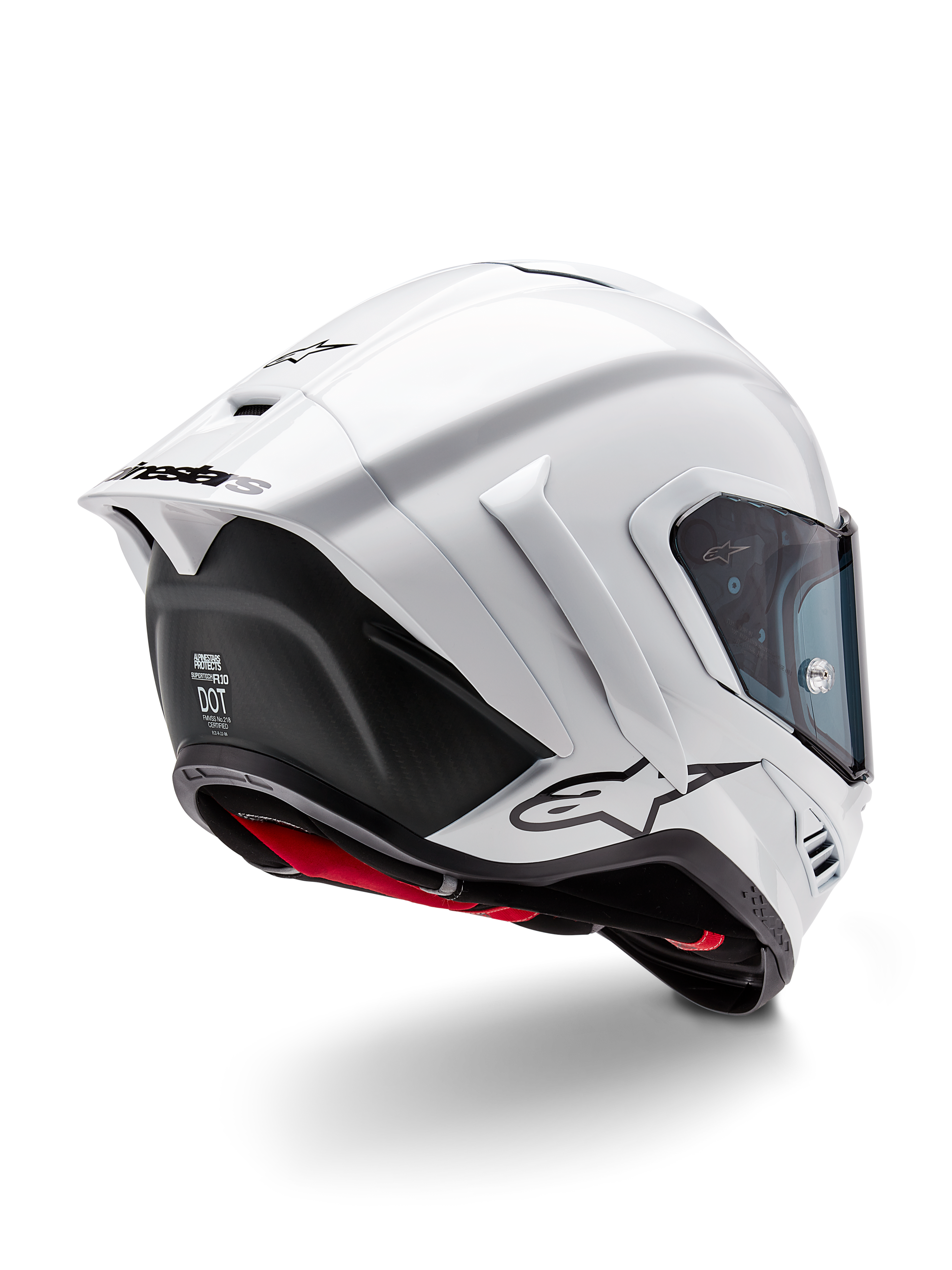 Alpinestars Supertech R10 Solid Hjälm, heltäckande racinghjälm för motorcykel, vit blank och svart matt, trekvartsvy bakifrån med aerodynamisk spoiler, sidovingar och svart logotyp