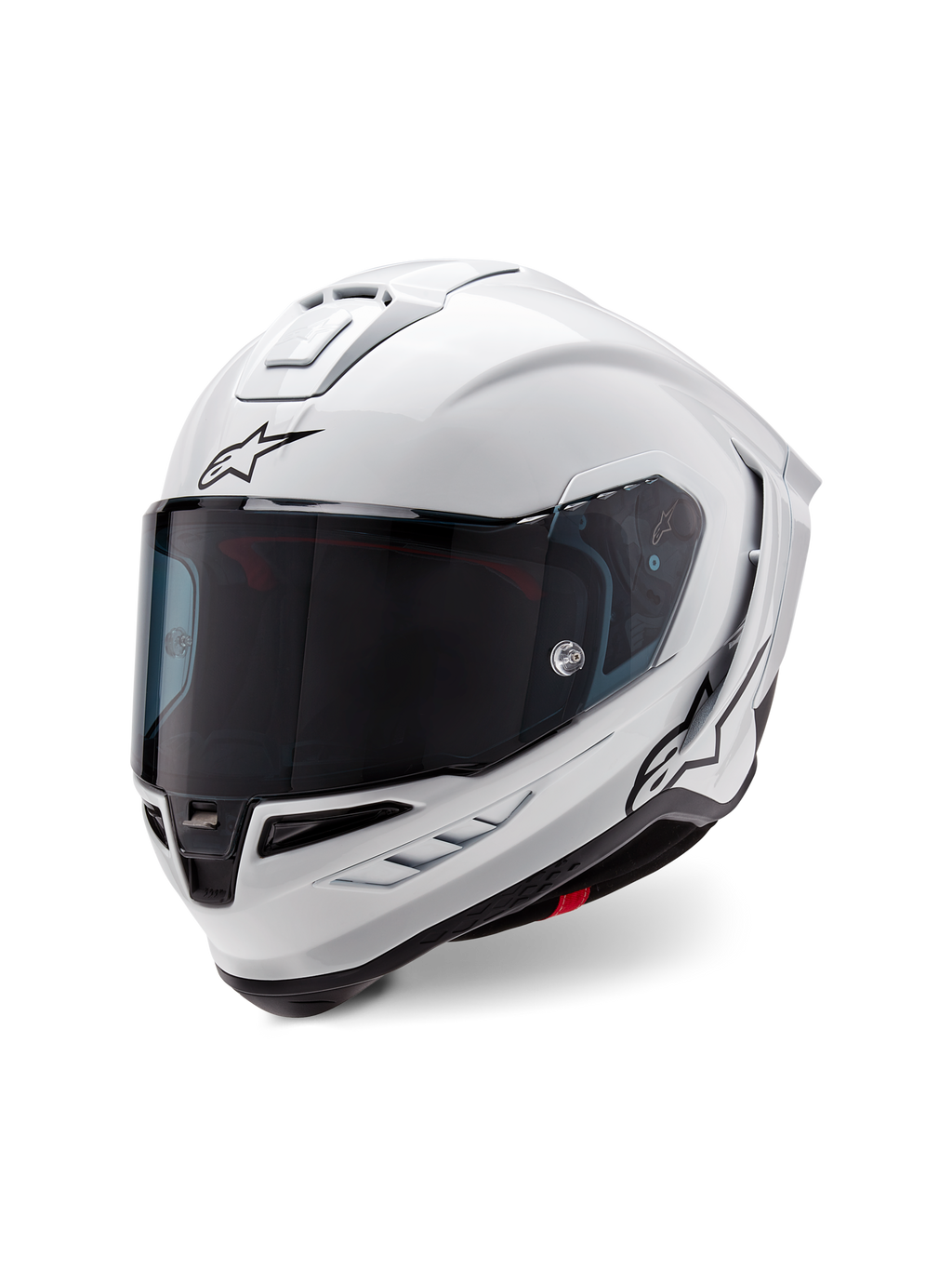 Alpinestars Supertech R10 Solid-hjälm, integralhjälm för racing, blankvit med svarta detaljer, mörkt tonat visir, aerodynamisk skaldesign och Alpinestars-logotyp på framsidan och sidan
