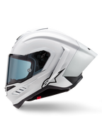 Alpinestars Supertech R10 Solid Hjälm, integralhjälm för racing, vit blank och svart matt, sidoprofil med integrerad aerodynamisk spoiler och tonat visir, med en svart Alpinestars stjärnlogotyp.