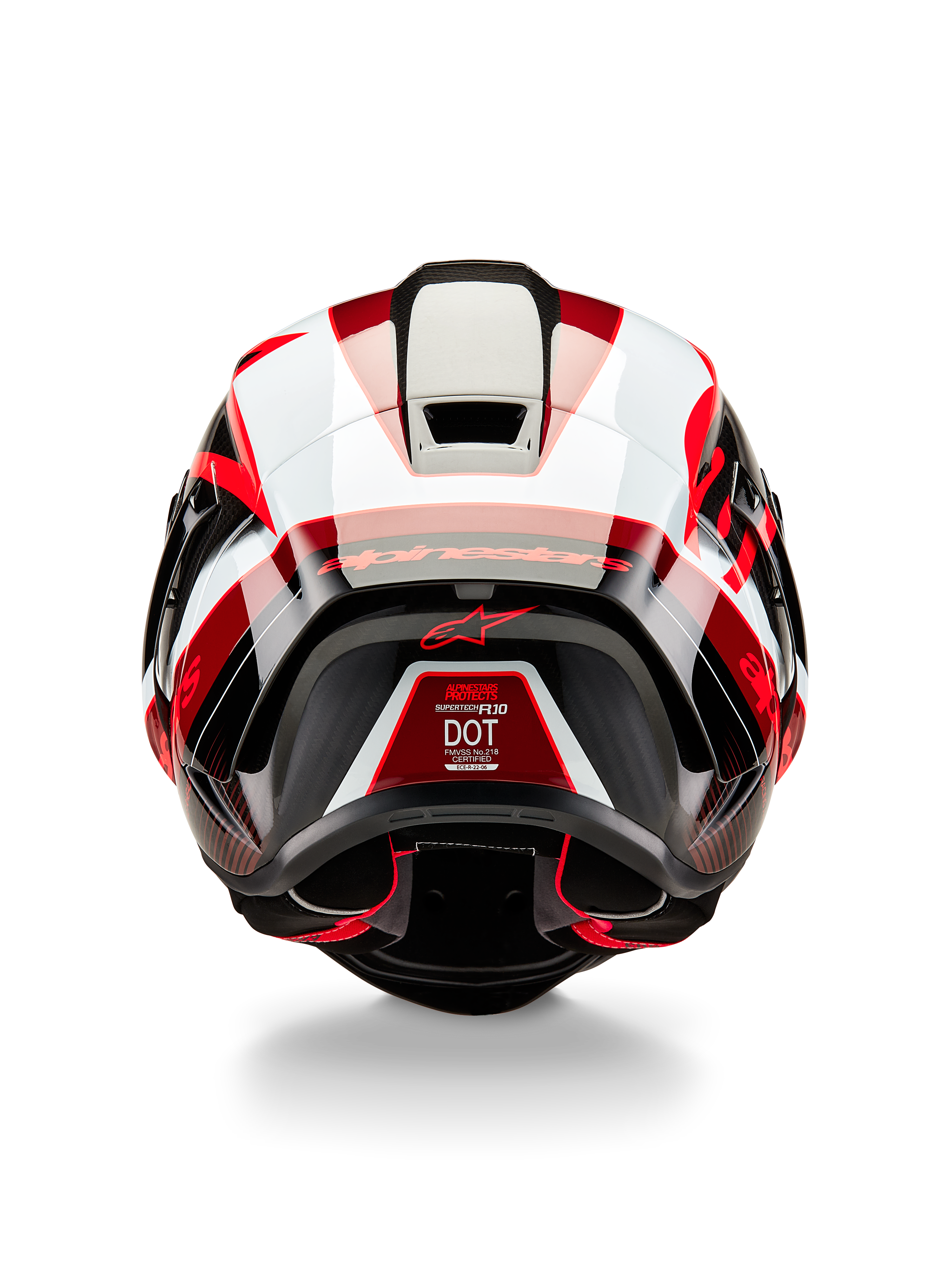 Alpinestars Supertech R10 Team hjälm, baksida, svart kolfiber, röd och vit glansig, aerodynamisk skaldesign med framträdande röda och vita paneler, Alpinestars-märkning på spoilern och en röd stjärnlogotyp, professionell racinghjälm för motorcykel