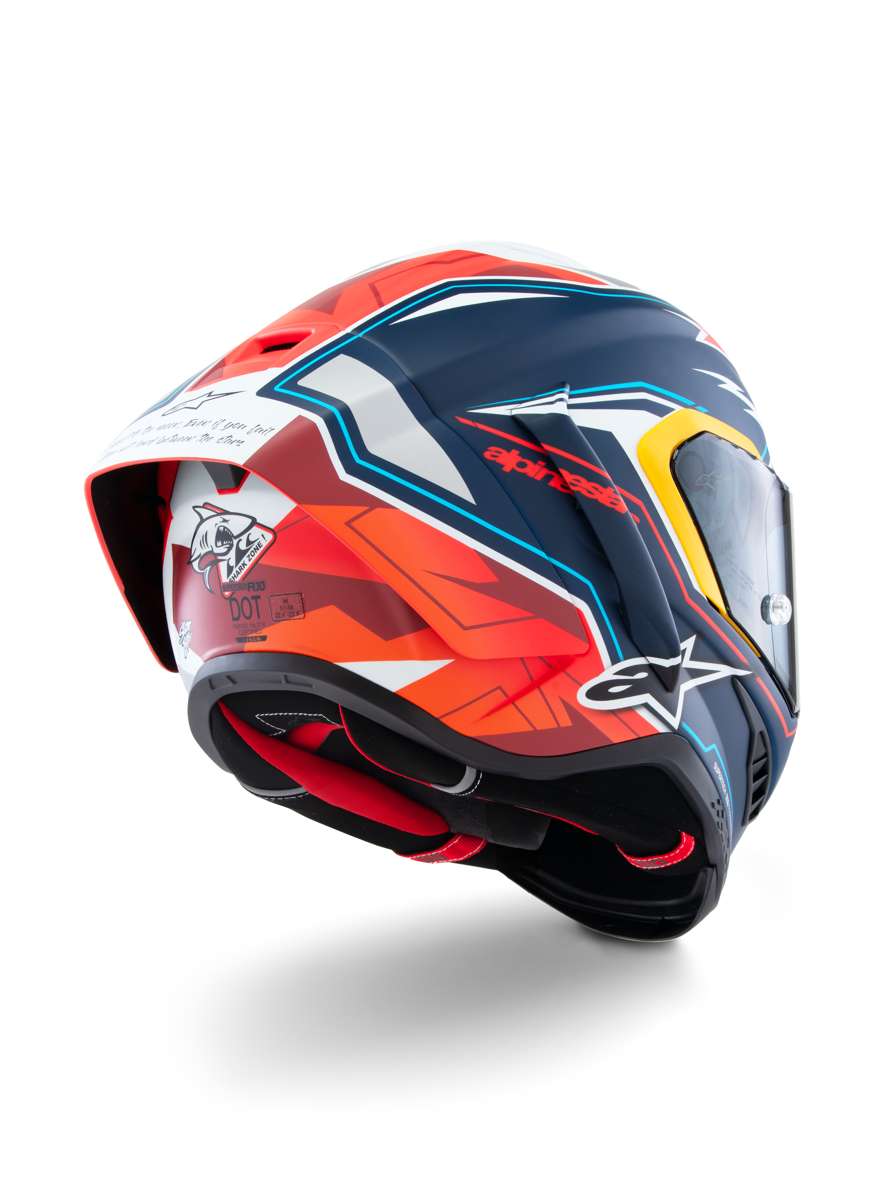 Alpinestars Supertech R10 Acosta Limited Edition-hjälm, sedd snett bakifrån, matt finish i blått, rött och vitt, med aerodynamisk spoiler, hajgrafik på baksidan, Alpinestars-logotyper och DOT-certifiering, högpresterande racinghjälm för motorcykel