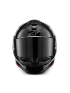 Alpinestars S-R7 Solid-hjälm, integralhjälm för motorcykel, blanksvart, vy framifrån med ett mörkt tonat visir, strömlinjeformat aerodynamiskt skal med ventilationsöppningar på hakan och hjässan, subtil silverfärgad Alpinestars-logotyp i pannan.