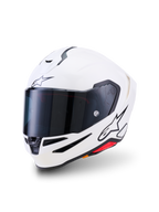 Alpinestars S-R7 Solid-hjälm, integralhjälm för motorcykel, vit glansig, mörkt röktonat visir, svart stjärnlogotyp på pannan och sidan, aerodynamiskt skal med ventilationsöppningar och röda accenter, högpresterande racing- och vägutrustning