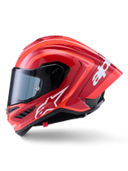 Alpinestars Supertech R10 Arius Helmet, Full-Face Racing Helmet, Glossy Red with white logo graphics, side profile view highlighting aerodynamic spoiler and clear visor, carbon fiber composite shell for professional motorsport
