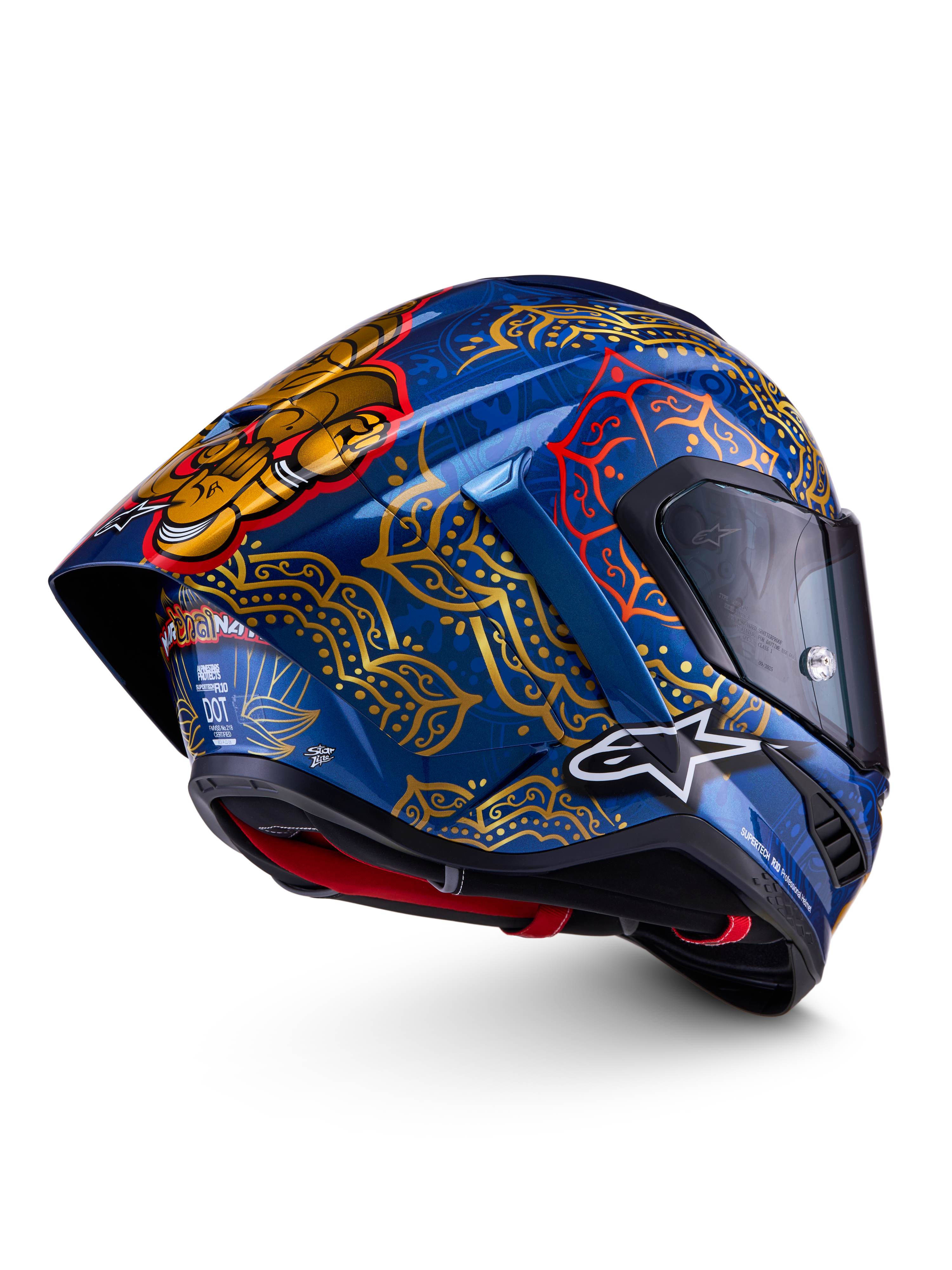Alpinestars Supertech R10 Martinator Thai hjälm, racinghjälm för motorcykel, blå och guld med mandalamönster, kolfiberskal, FIM- och ECE-certifierad.